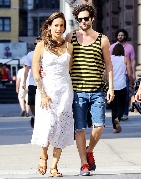 Penn Badgley with his then-girlfriend Domino Kirke in an outing in 2014.